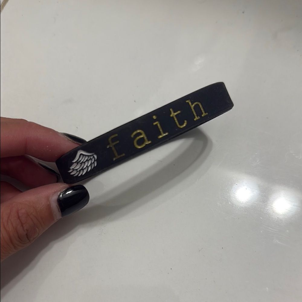 Black 'Faith' Bracelet with Wing Design - LUKE & PHIL Quoted Rubber Bracelet